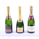 A bottle of Krug Grande Cuvee Champagne together with a Moet & Chandon Champagne and a Wine