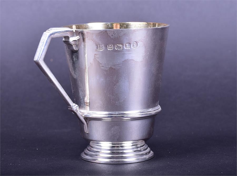 A George V silver christening cup Birmingham 1935 by Barker Brothers Silver Ltd, with silver gilt