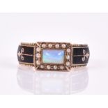 A Victorian yellow gold, opal, pearl, and enamel mourning ring the square mount set with a
