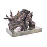 A late 20th century cast green patinated bronze sculpture of a stylised triceratops moulded all over