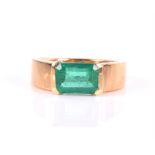 An 18ct yellow gold and emerald ring set with an emerald-cut emerald of approximately 2.30 carats,