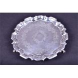 A George V silver salver Sheffield 1911 by Langfords Silver Galleries, with engraved decoration, and