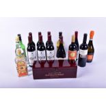 Twenty-two bottles of assorted wines and spirits to include six Chateau Tour de Naujan 2005, a cased