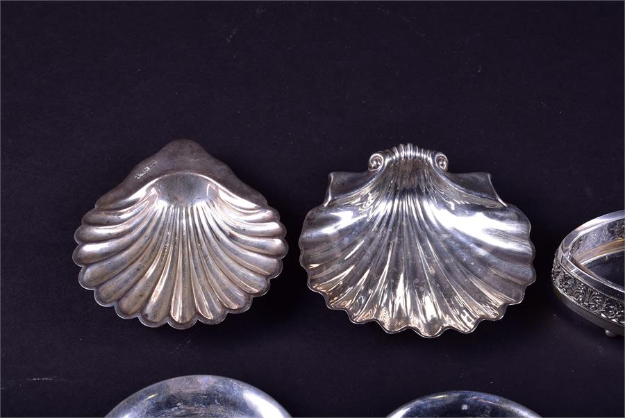A mixed group of 19th century and later silver dishes and baskets to include two shell formed - Image 3 of 11