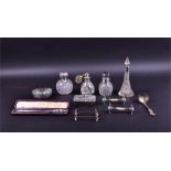 A selection of silver plate and crystal cut items comprising one silver mounted cut crystal scent