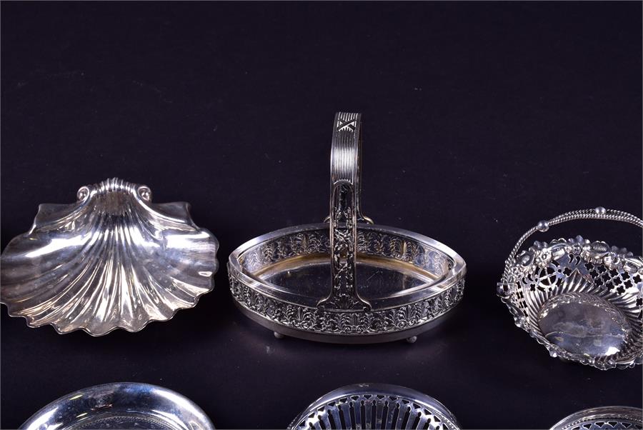 A mixed group of 19th century and later silver dishes and baskets to include two shell formed - Image 4 of 11