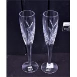 Three pairs of Waterford Crystal champagne flutes designed by John Rocha, number 100623, each 26