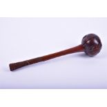 A 19th century Fijian Ula Throwing Club with knotted head, and gently tapered stem, with carved