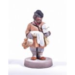 A Russian Gardner Porcelain Factory figure modelled as a bisque porcelain tea and bagel vendor,