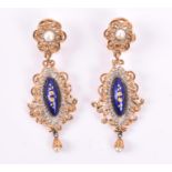 A pair of Italian yellow gold, enamel, and pearl earrings each with a pearl set in a yellow gold