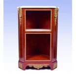 A late 18th century Louis XVI style ormolu mounted mahogany corner cabinet by Jean Henri Riesener (