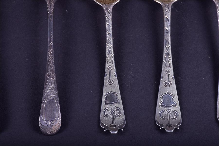 A collection of 18th century and later silver fruit spoons comprising one trio and two pairs, - Image 5 of 9