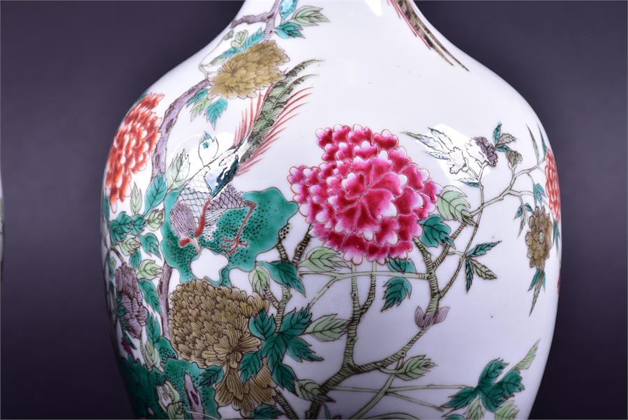 A pair of 19th century Chinese porcelain vases the ovoid shaped bodies decorated with enamelled - Image 4 of 21