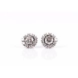 A pair of diamond stud earrings each set with a round brilliant-cut diamond weighing approximately