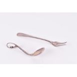 A Georg Jensen silver blossom pattern preserve spoon with London import marks for 1951, 10.5 cm