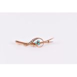 A 9ct yellow gold and turquoise bar brooch set with split seed pearls, 5 cm long, 3.3 grams.