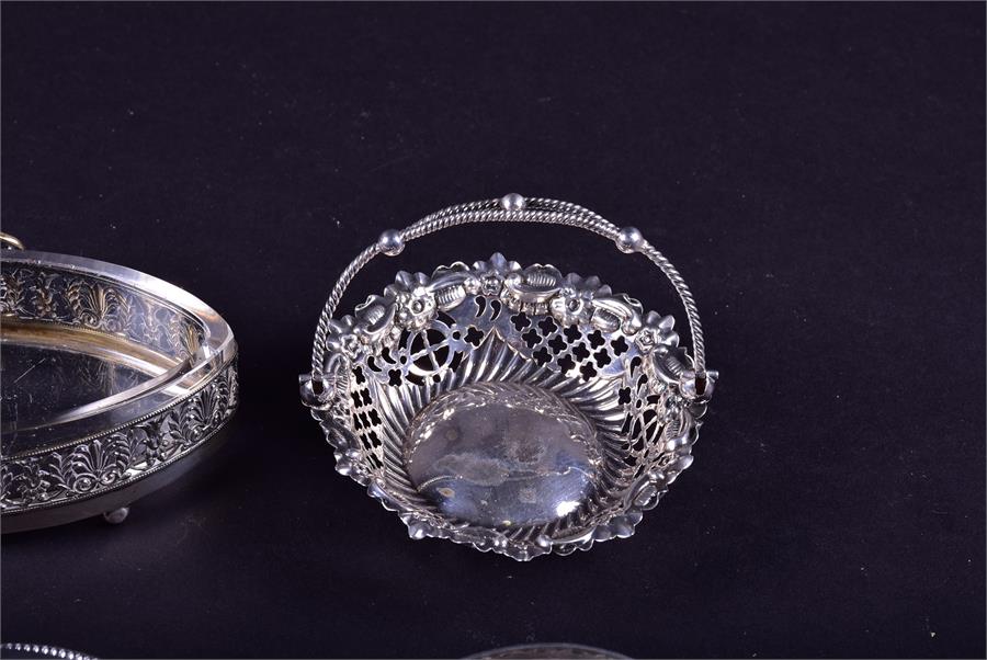 A mixed group of 19th century and later silver dishes and baskets to include two shell formed - Image 5 of 11
