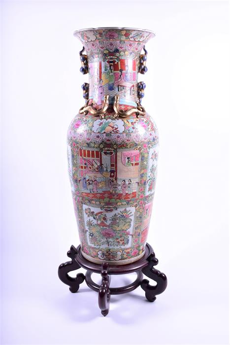 A very large floor standing 20th century Chinese porcelain famille rose vase decorated with hand