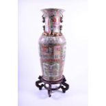 A very large floor standing 20th century Chinese porcelain famille rose vase decorated with hand