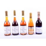 A bottle of Puttonyos Tokaji Aszu 1990 dessert wine together with two bottles of Tokaji Aszu 1996, a