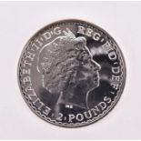 MIXED COINS, GREAT BRITAIN. A mint tube of twenty Fine Silver Britannias, 2014 Contained in the