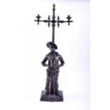A late 19th/early 20th century spelter figural table lamp titled 'Siffleur' and signed 'Millard'