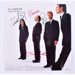 David Bowie, Tin Machine Under The God, a 10 inch record signed by Bowie and Tony Sales, Reeves