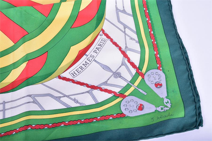 A Hermes silk scarf in the Spinnakers pattern decorated with boats and sails, together with a Dior - Image 6 of 6