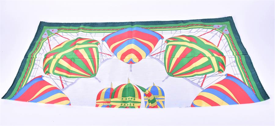 A Hermes silk scarf in the Spinnakers pattern decorated with boats and sails, together with a Dior - Image 3 of 6