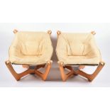 A late 20th century or early 21st century pair of Luna low back chairs, made in Thailand with