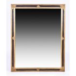 A large 20th century gilt and ebony framed mirror with bevel-edged plate, 139 cm x 107 cm (total