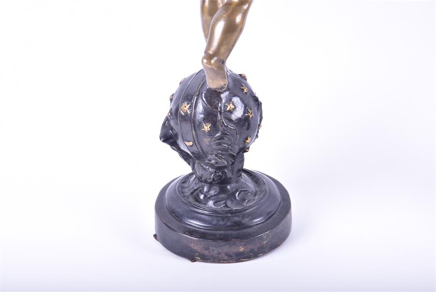 A pair of decorative cast metal figures of winged cherubs each figure standing upon a starred globe, - Image 2 of 6