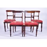 A set of four Georgian bar back dining chairs with curved backs and drop-in tapestry seats depicting