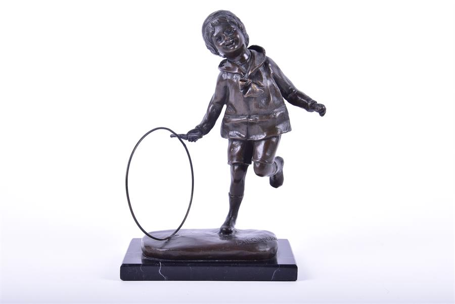 After Demetre Chiparus a bronze study of a young boy in early 20th century dress, running with a