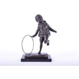 After Demetre Chiparus a bronze study of a young boy in early 20th century dress, running with a