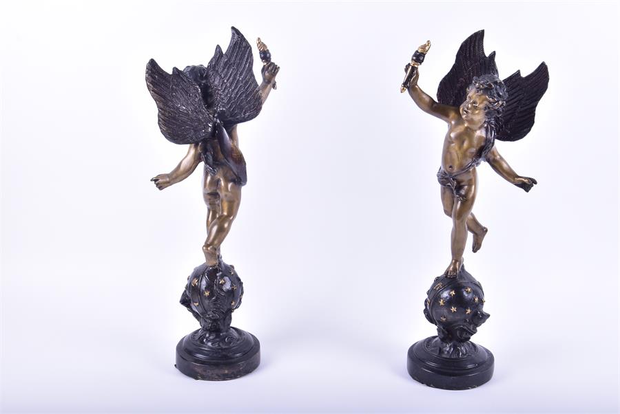 A pair of decorative cast metal figures of winged cherubs each figure standing upon a starred globe, - Image 5 of 6