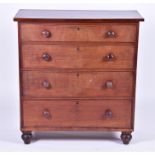 A late Victorian mahogany chest with a set of four graduated drawers with turned wooden handles,