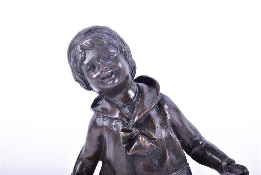 After Demetre Chiparus a bronze study of a young boy in early 20th century dress, running with a - Image 4 of 4