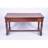 An English 18th century farmhouse table the side with fitted drawer, supported on four turned legs