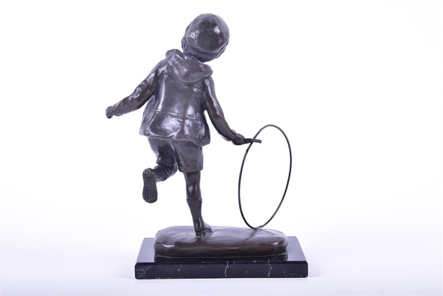 After Demetre Chiparus a bronze study of a young boy in early 20th century dress, running with a - Image 2 of 4