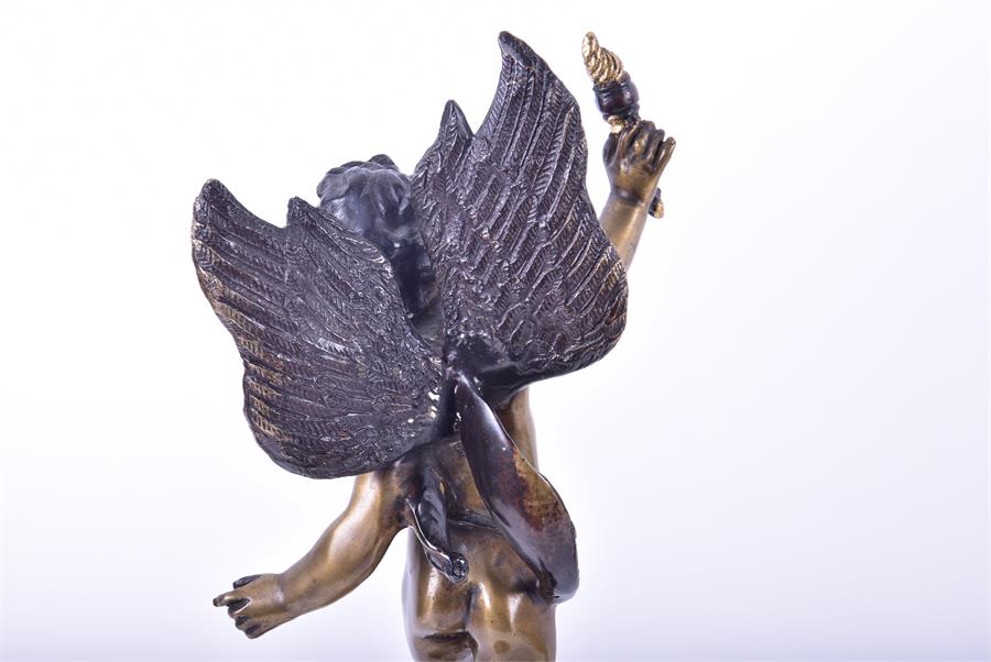 A pair of decorative cast metal figures of winged cherubs each figure standing upon a starred globe, - Image 6 of 6