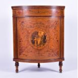 A fine 19th century Sheraton Revival satinwood corner cabinet retailed by Maple & Co, the surface