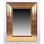 A contemporary gilt framed mirror with bevel-edged plate, 85 cm x 108 cm (full dimensions).