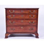 A George III period mahogany chest of drawers the four graduated drawers with brass swan neck