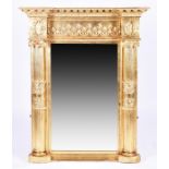 A large Regency style gilt-gesso overmantle mirror designed in the Neoclassical style flanked with