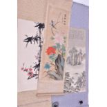 Three Chinese painted silk scrolls one detailing a lake landscape with calligraphy, the second a