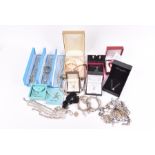 A group of silver and costume jewellery items to include various enamelled Dutch charms and