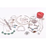 A group of silver, white metal, and gemstone jewellery items to include a sterling silver Gucci