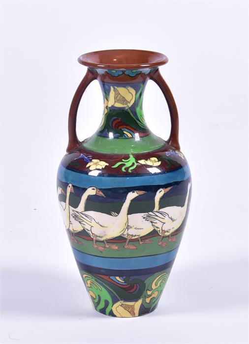 A Frederick Rhead Foley 'Intarsio' pattern pottery vase of ovoid shape with flared rim and twin