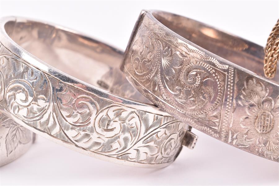 A Victorian Revivalist style silver bangle by Sydenham bros, together with three late 19th / early - Image 3 of 4